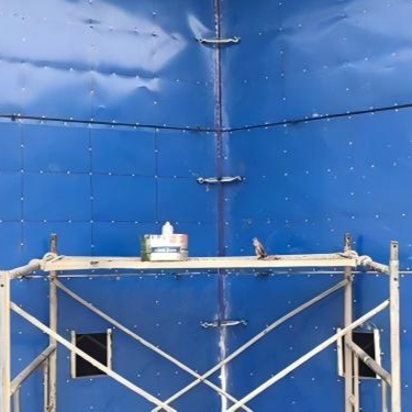 Grain silo barrier door