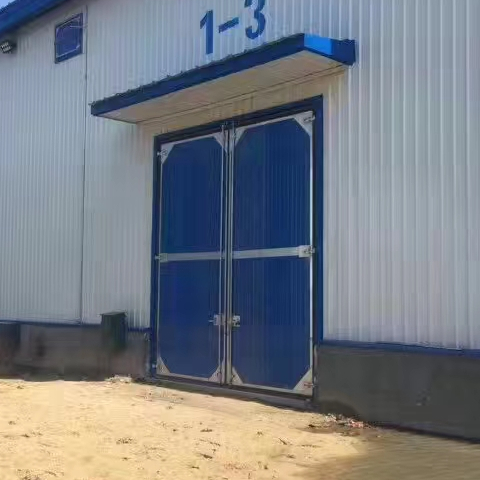 Insulated grain storage door